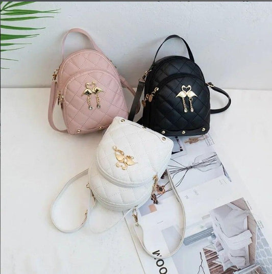 RAYCRAFT WORLD Mini Quilted Backpack Purse with Flamingo Charm, PU Leather, Dual gold-tone swan charm with heart-shaped heads and dangling pearl-like beads, Crossbody Strap