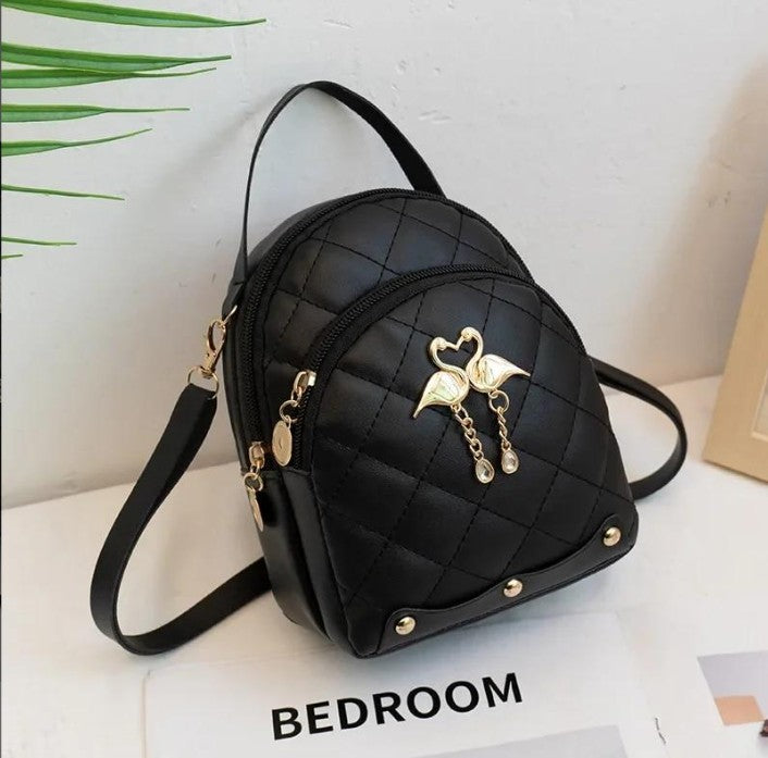 RAYCRAFT WORLD Mini Quilted Backpack Purse with Flamingo Charm, PU Leather, Dual gold-tone swan charm with heart-shaped heads and dangling pearl-like beads, Crossbody Strap
