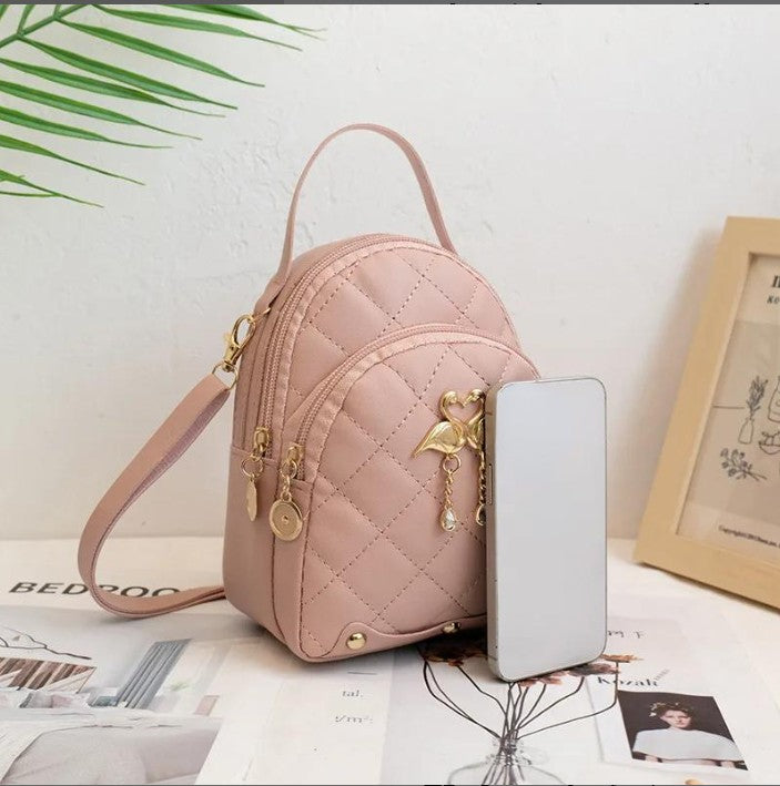 RAYCRAFT WORLD Mini Quilted Backpack Purse with Flamingo Charm, PU Leather, Dual gold-tone swan charm with heart-shaped heads and dangling pearl-like beads, Crossbody Strap