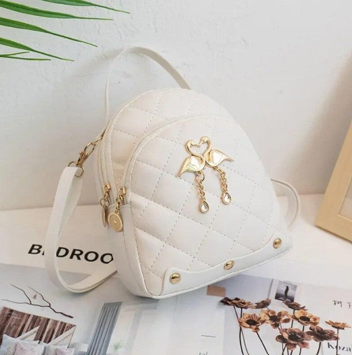 RAYCRAFT WORLD Mini Quilted Backpack Purse with Flamingo Charm, PU Leather, Dual gold-tone swan charm with heart-shaped heads and dangling pearl-like beads, Crossbody Strap